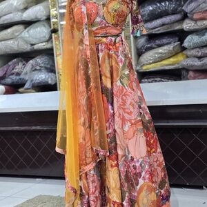 Elegant Floral Maxi Dress with Orange and Pink Hues